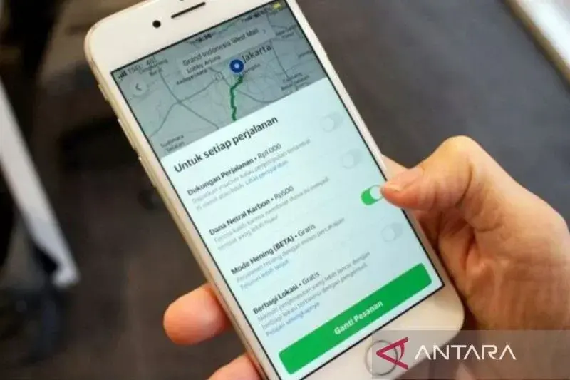 Ilustrasi - Penggunaan fitur dalam aplikasi GrabCar. ANTARA/HO-Grab/am.